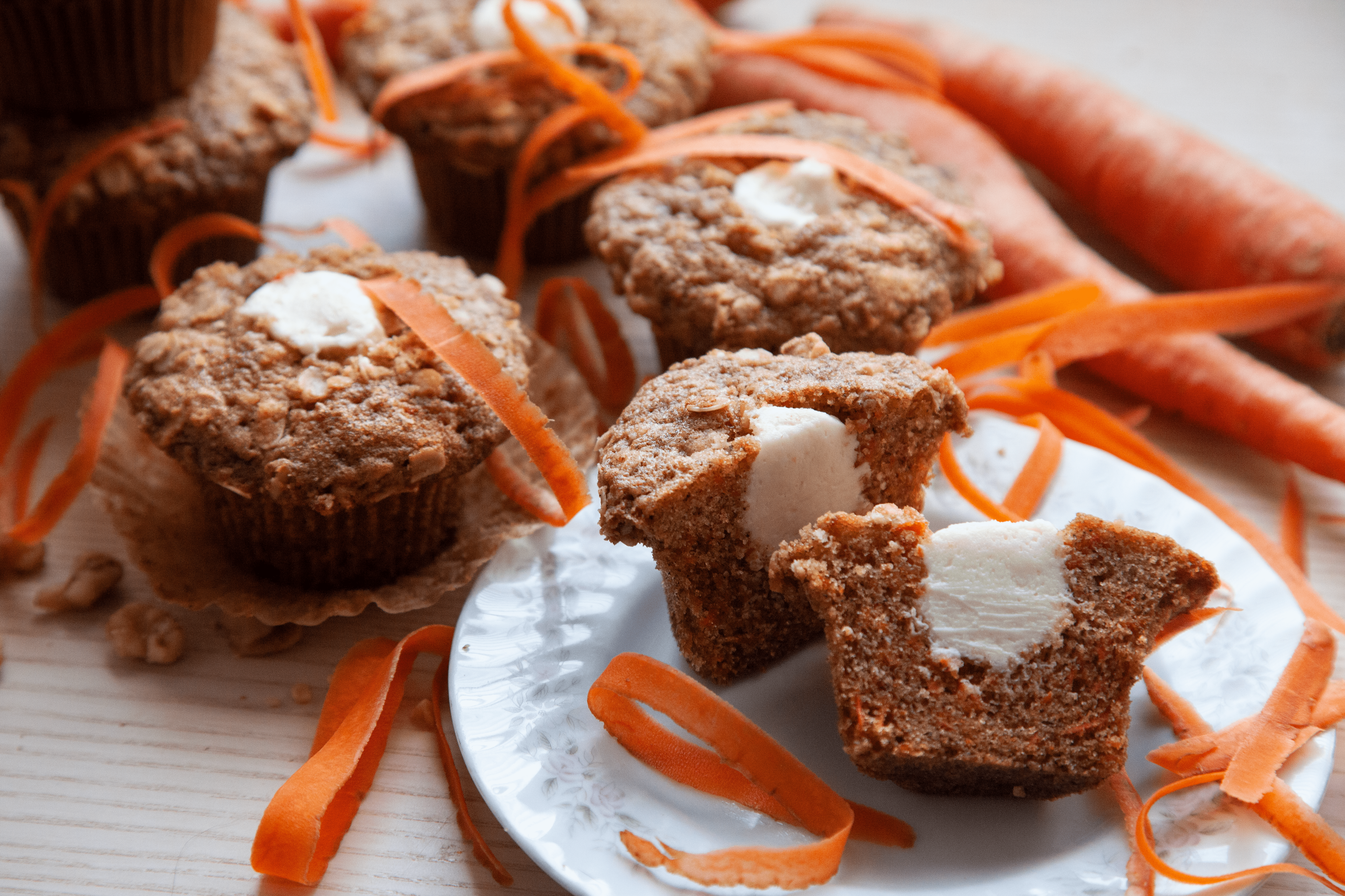 carrot muffins filled with cream cheese frosting